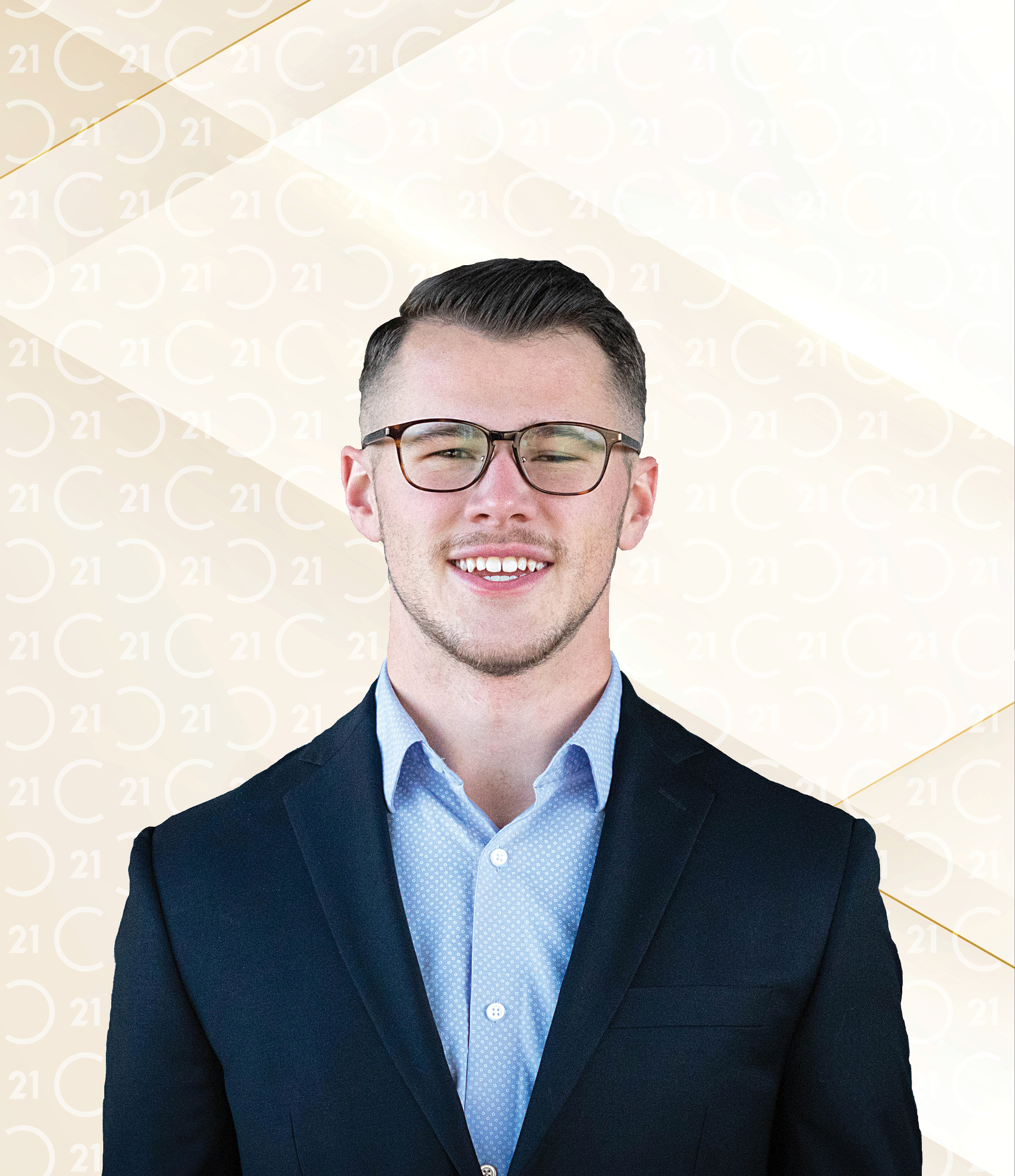 Professional photo of Austin Titus, a smiling man with short, neatly styled hair and a trimmed beard, wearing glasses, a dark blazer, and a light blue button-up shirt. His name 'Austin Titus' appears in bold black text to the right. The background is light with a subtle Century 21 logo pattern and diagonal gold accents, featuring the 'CENTURY 21' logo in the top right corner.