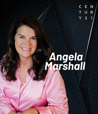 Professional photo of Angela Marshall, a smiling woman with long, dark wavy hair, wearing a light pink satin blouse. Her name 'Angela Marshall' appears in bold white text to the right. The background is dark with a subtle Century 21 logo pattern and diagonal design elements, featuring the 'CENTURY 21' logo in the top right corner.